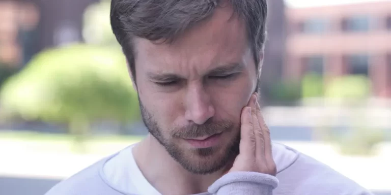 Sintomas de infecção no dente extraído